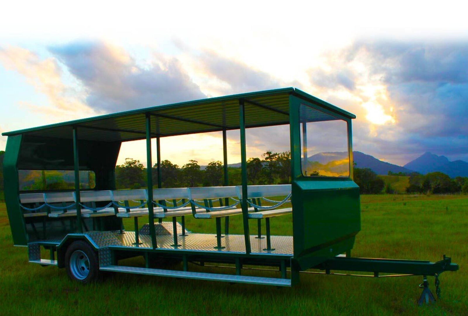Custom built open people mover trailer photographed at dusk in the Tweed Valley
