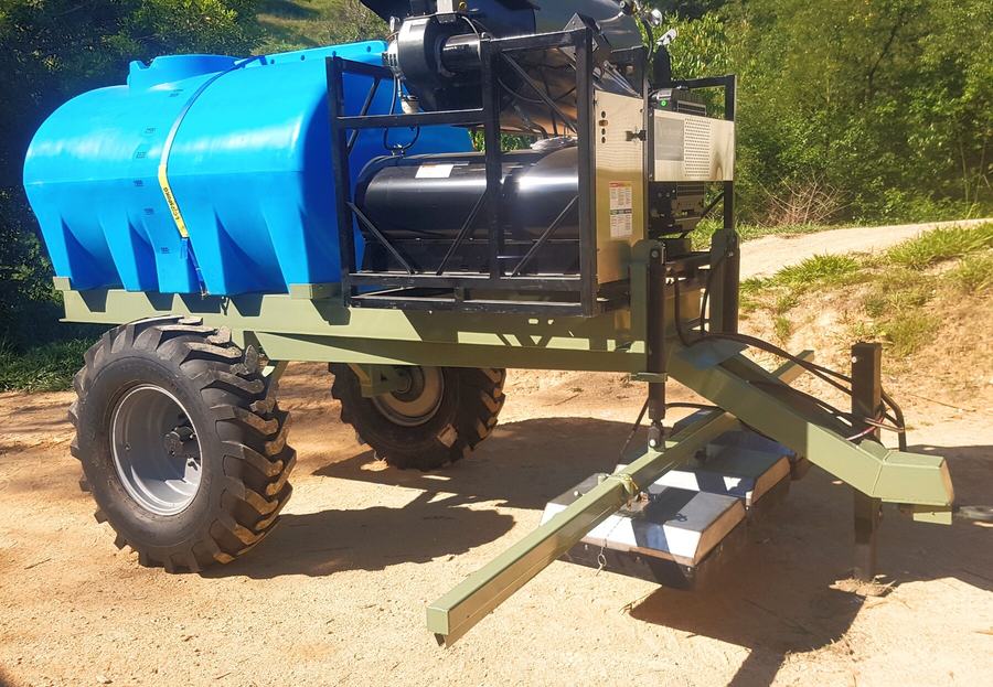 Custom agricultural spray trailer with water tank and flotation tyres